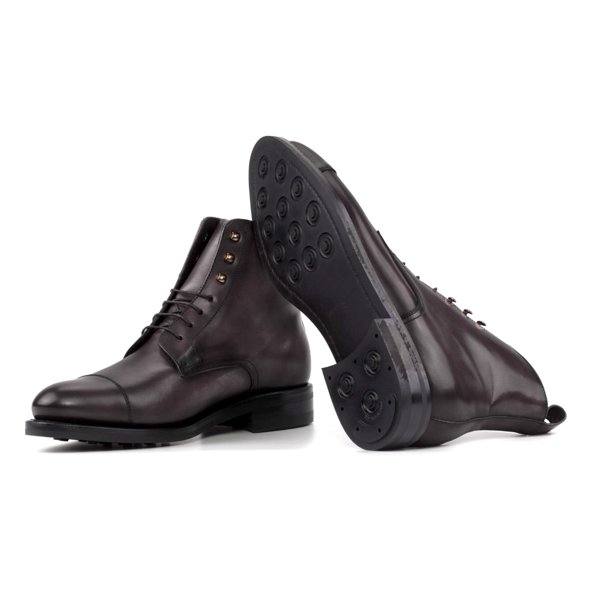 Bottines Bout Droit en cuir sang-de-bœuf : une bottine couchée montre la semelle