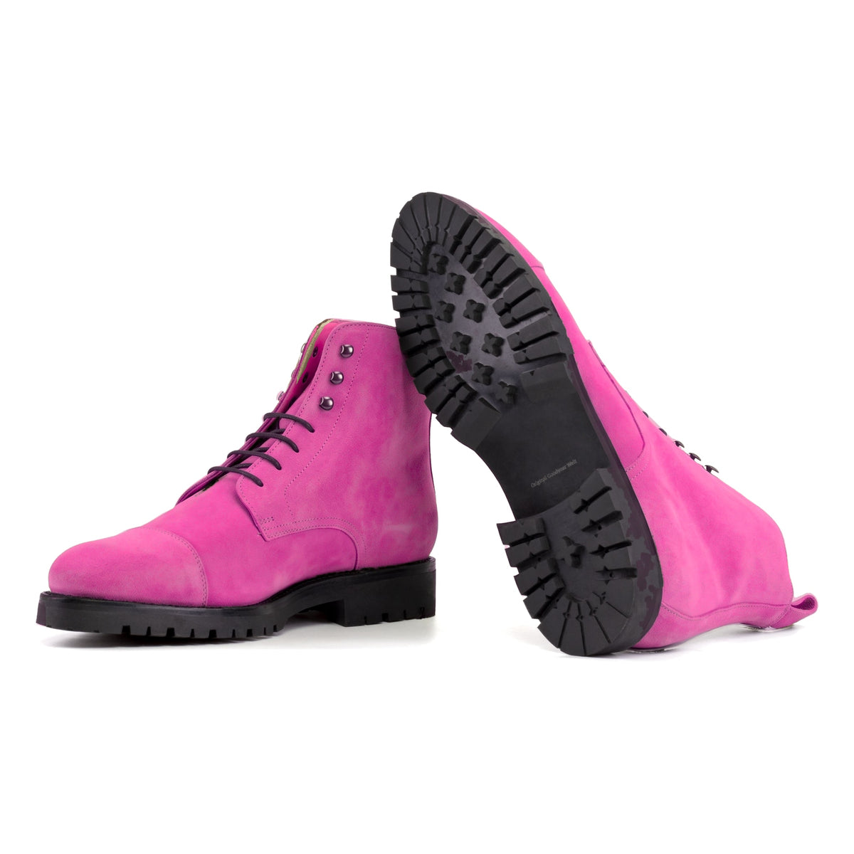 Bottines Bout Droit en daim de chevreau fuchsia : une bottine couchée montre la semelle