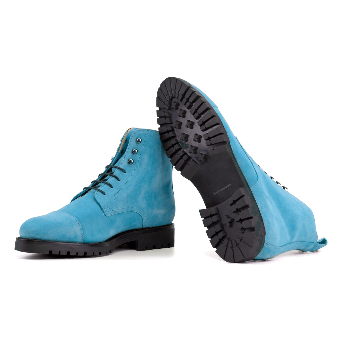 Bottines Bout Droit en daim de chevreau turquoise : une bottine couchée montre la semelle