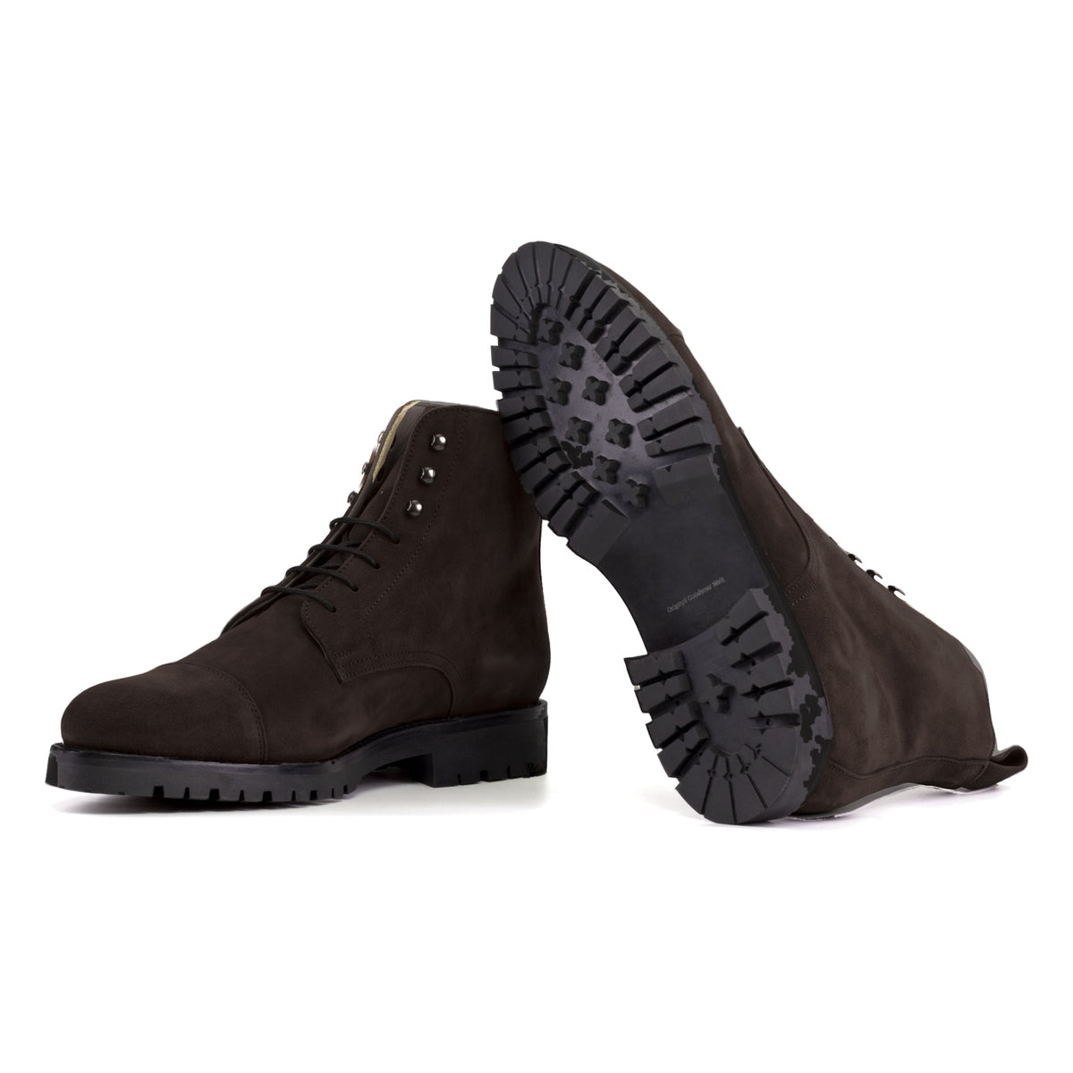 Bottines Bout Droit en daim marron foncé : une bottine couchée montre la semelle