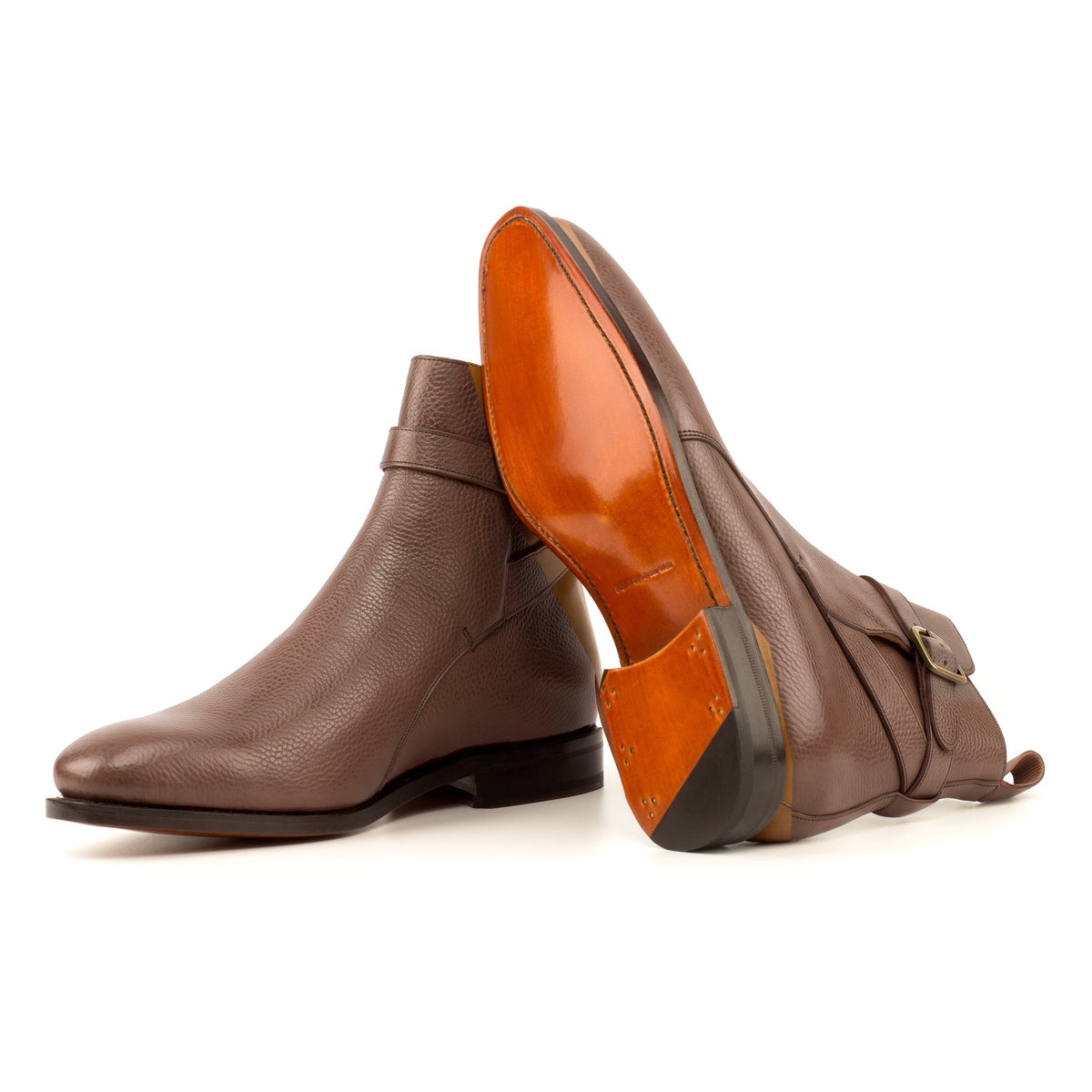 Bottines Jodhpur en cuir gros grain marron moyen : une bottine couchée montre la semelle