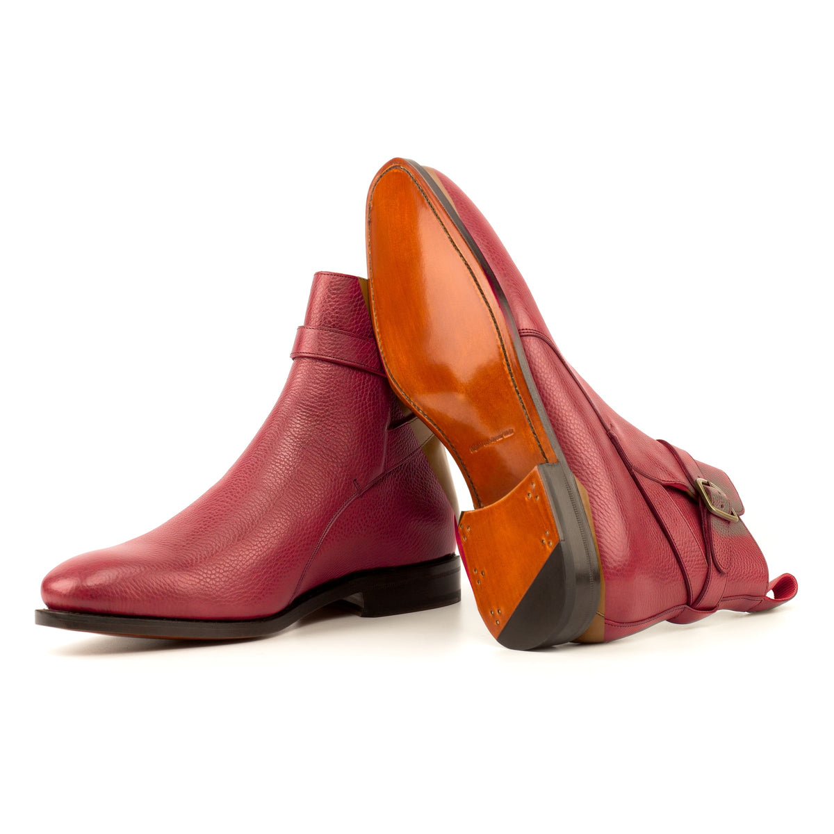Bottines Jodhpur en cuir gros grain rouge : une bottine couchée montre la semelle