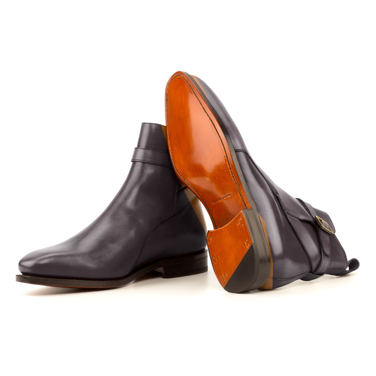 Bottines Jodhpur en cuir sang-de-bœuf : une bottine couchée montre la semelle