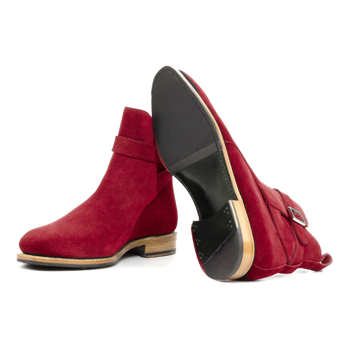 Bottines Jodhpur en daim de chevreau rouge : une bottine couchée montre la semelle