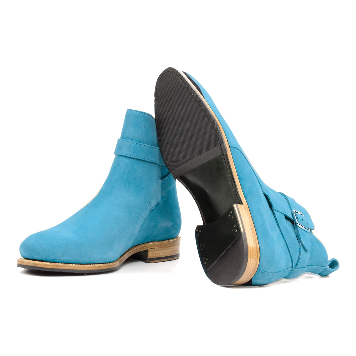 Bottines Jodhpur en daim de chevreau turquoise : une bottine couchée montre la semelle