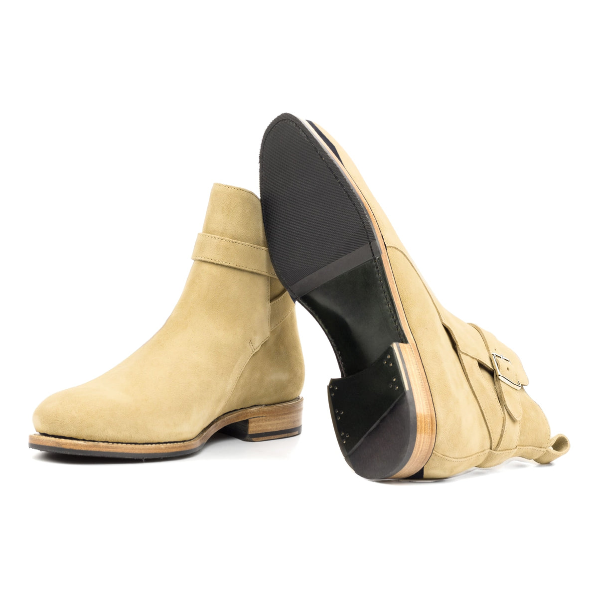 Bottines Jodhpur en daim sable : une bottine couchée montre la semelle