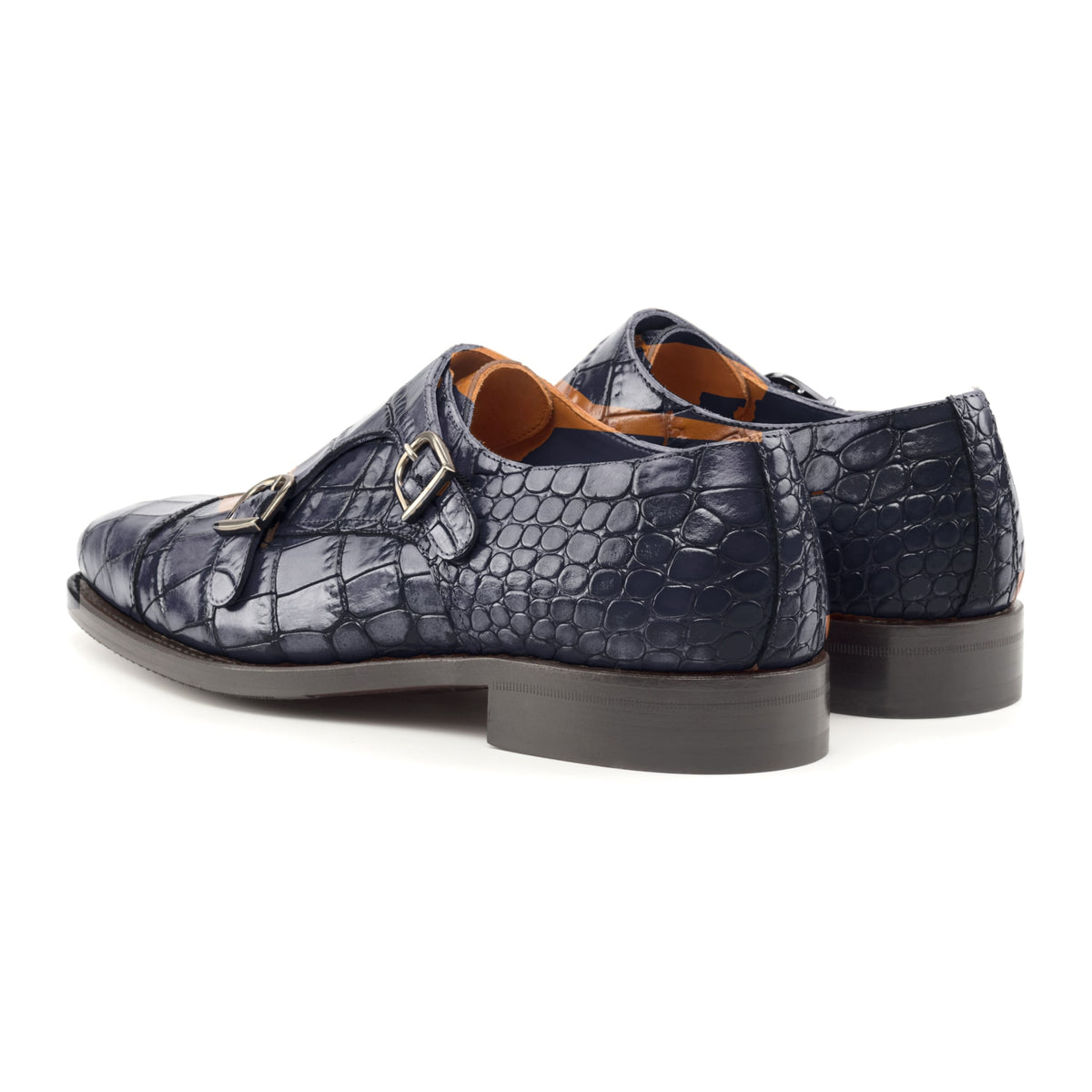 Chaussure double boucle en cuir croco bleu marine, la paire vue de trois quarts arrière